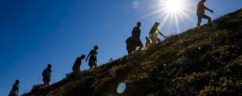 La course sportive Sierre-Zinal fête ses 50 ans d'existence en 2023 (image d'illustration). [Keystone - Valentin Flauraud]