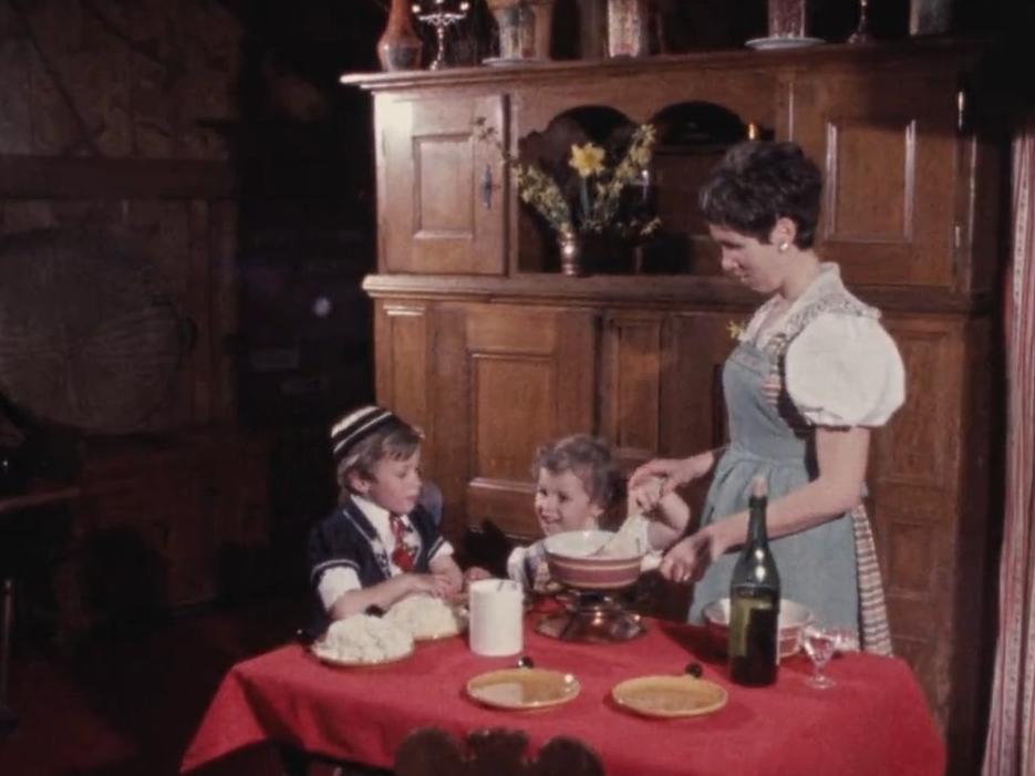 Préparation d'une fondue en Gruyère en 1969.