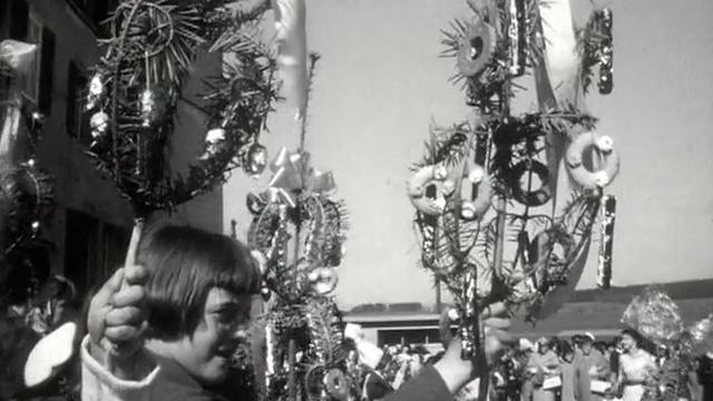 La procession des rameaux ouvre la Semaine sainte en 1960. [RTS]