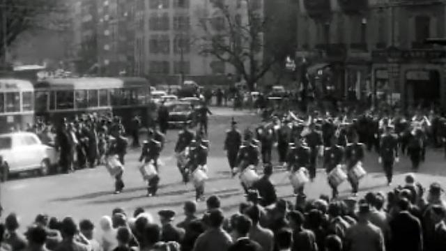 Le défilé du corps de musique l'Elite dans la ville de Genève.