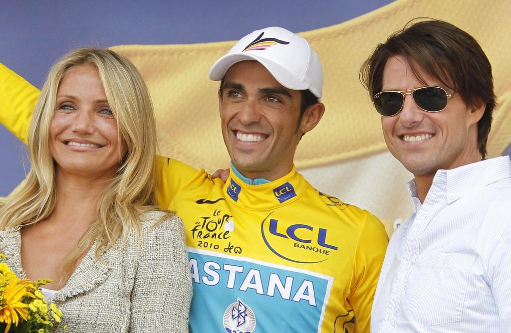 Un podium de charme et de talent composé de Cameron Diaz, Alberto Contador et Tom Cruise. [KEYSTONE - GUILLAUME HORCAJUELO]