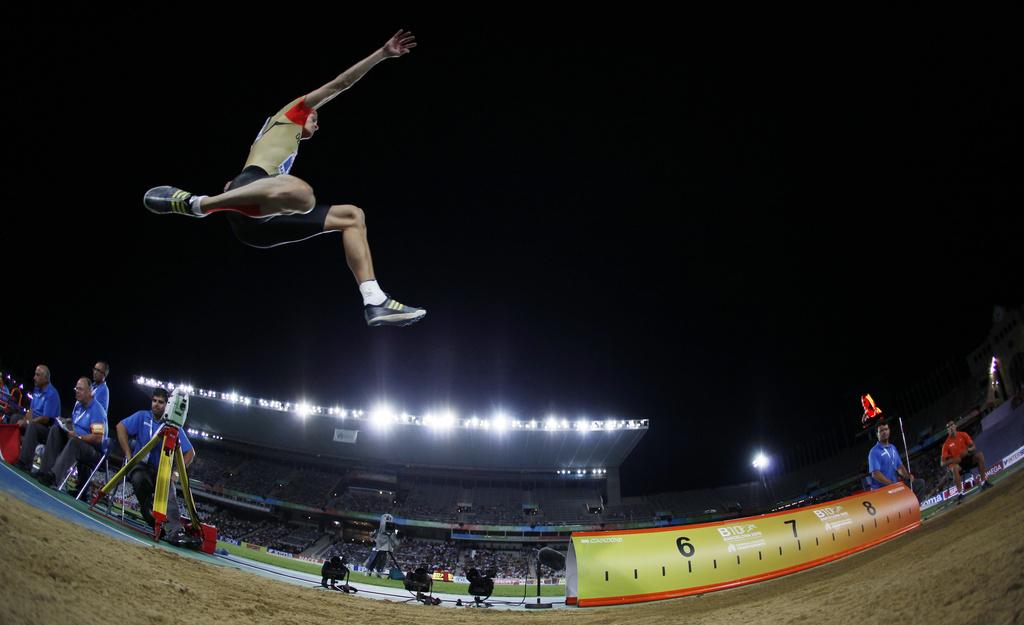 L'Allemand Christian Reif a réussi la meilleure performance mondiale de l'année et explosé de 20cm son record personnel. [KEYSTONE - Matt Dunham]