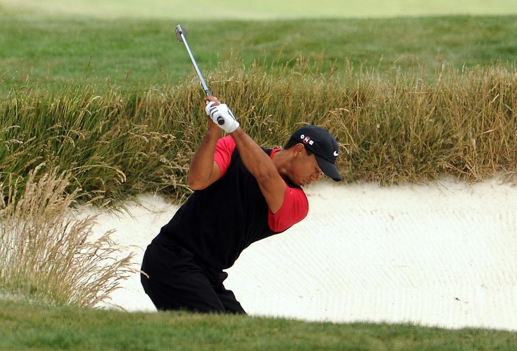Tiger Woods est abonné aux 4e places cette année. [KEYSTONE - ANDREW GOMBERT]