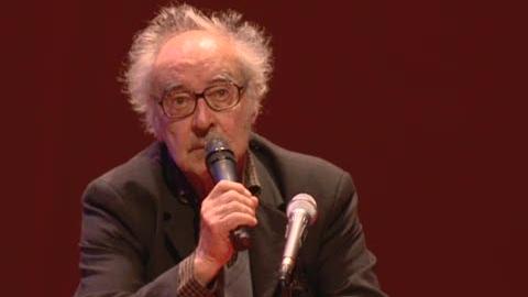 Le cinéaste Jean-Luc Godard parle de son dernier film "film socialisme" ou Forum de Meyrin à Genève.