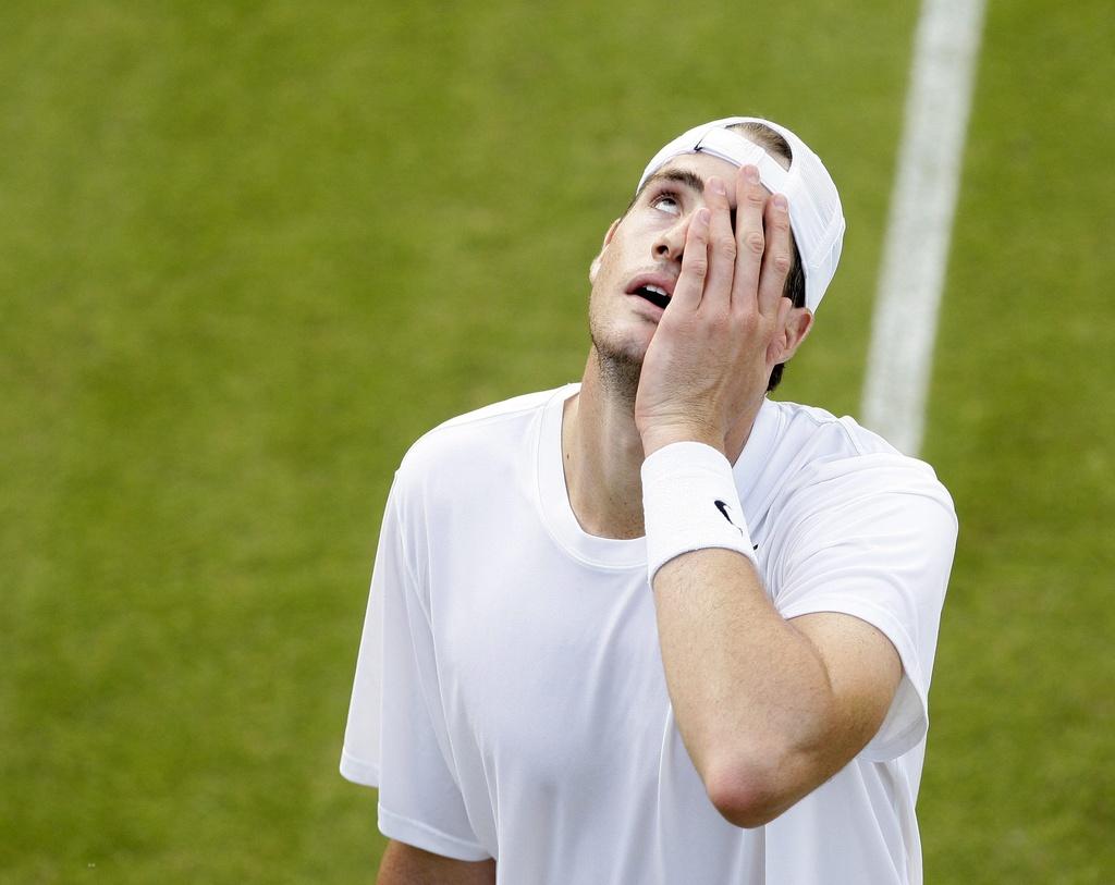 John Isner n'arrive pas à y croire... [KEYSTONE - FELIPE TRUEBA]