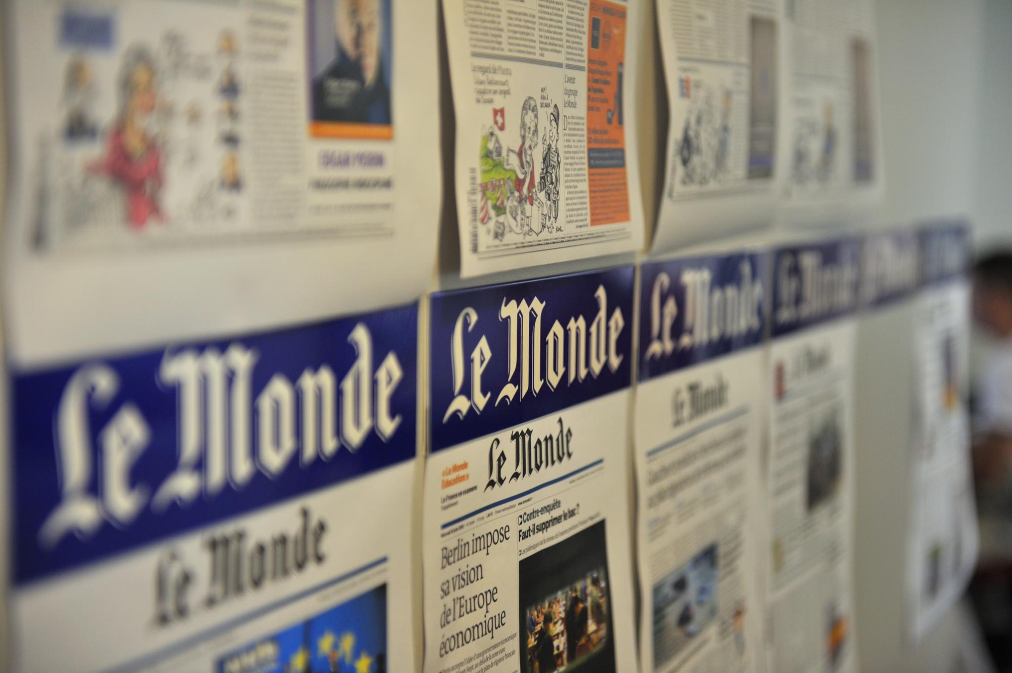 Le Monde accuse l'Elysée de violation du secret des sources. [REUTERS - � Philippe Wojazer / Reuters]