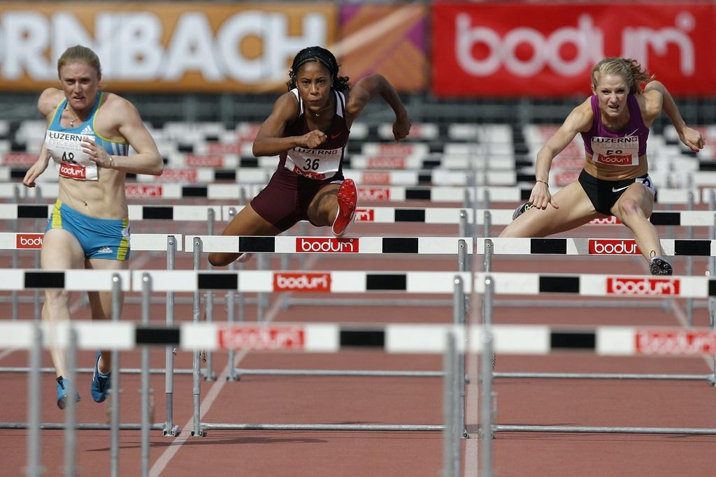 Un record personnel manqué de peu pour Lisa Urech (à droite). [KEYSTONE - PETER KLAUNZER]