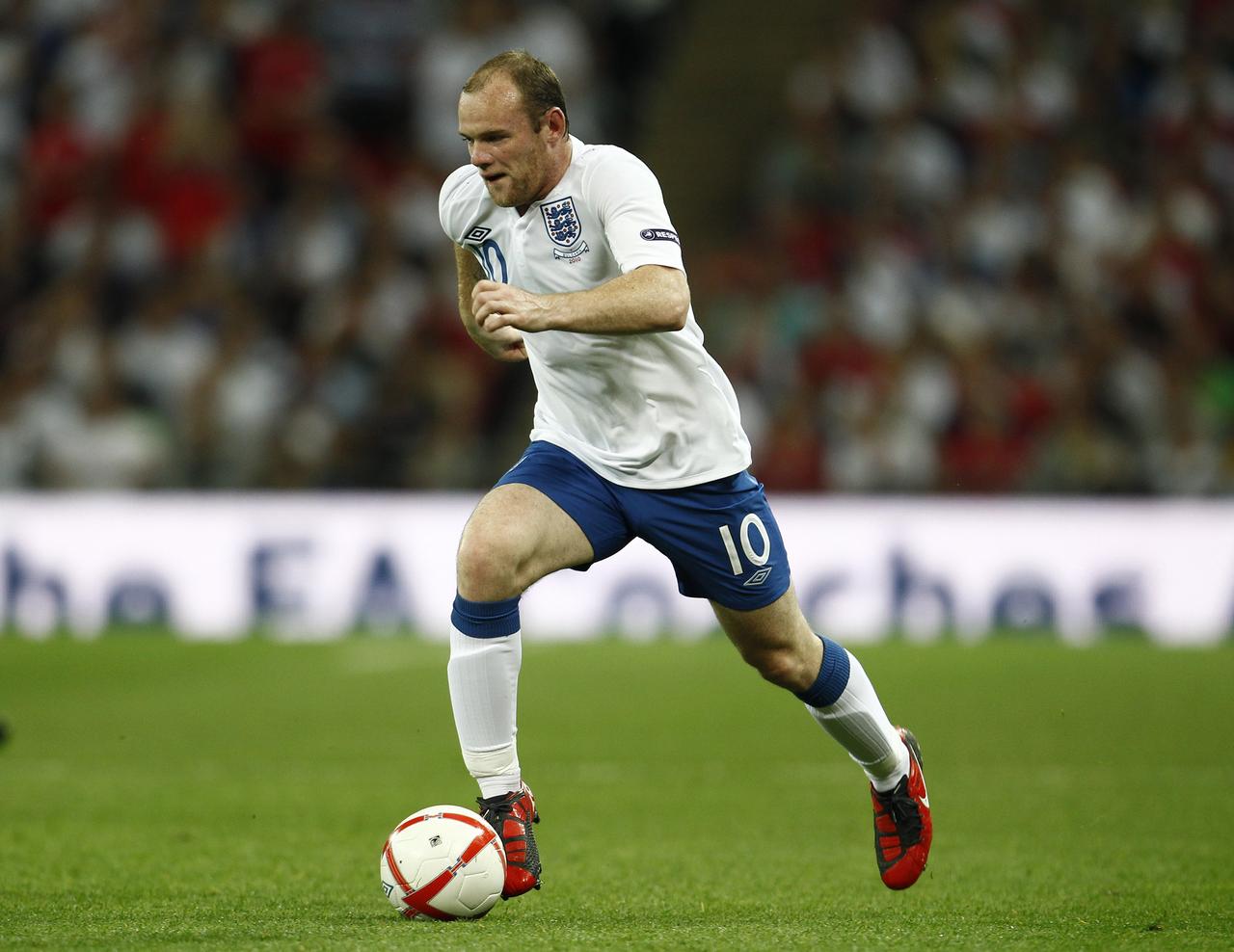 La défense suisse aura fort à faire pour contrer Wayne Rooney. [REUTERS - � Eddie Keogh / Reuters]