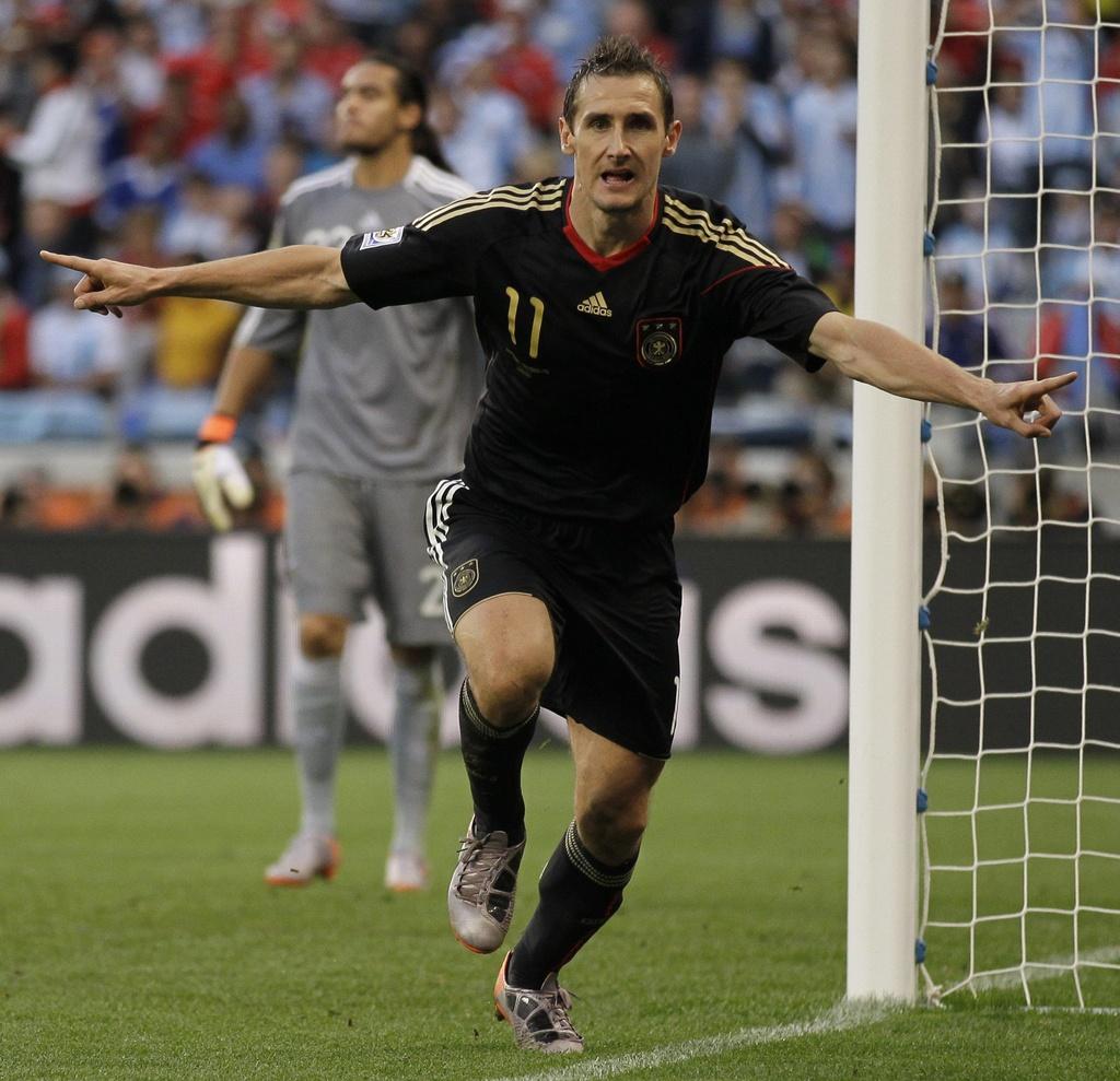 Klose a marqué ses 13e et 14e buts en Coupe du monde. [KEYSTONE - Matt Dunham]