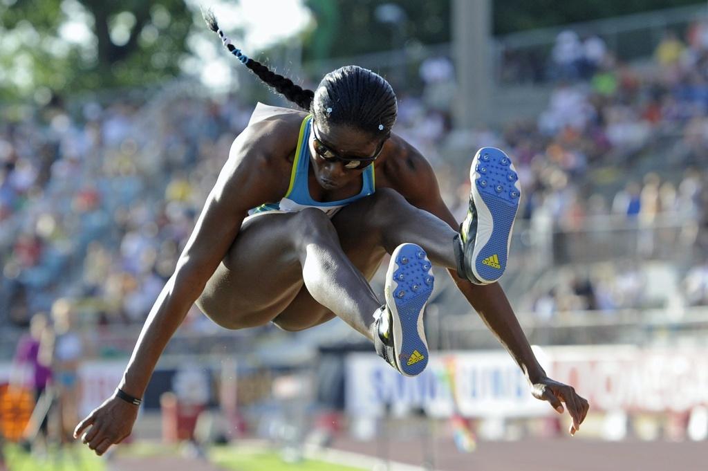 Savigne a brillé lors du triple saut féminin. [KEYSTONE - JEAN-CHRISTOPHE BOTT]