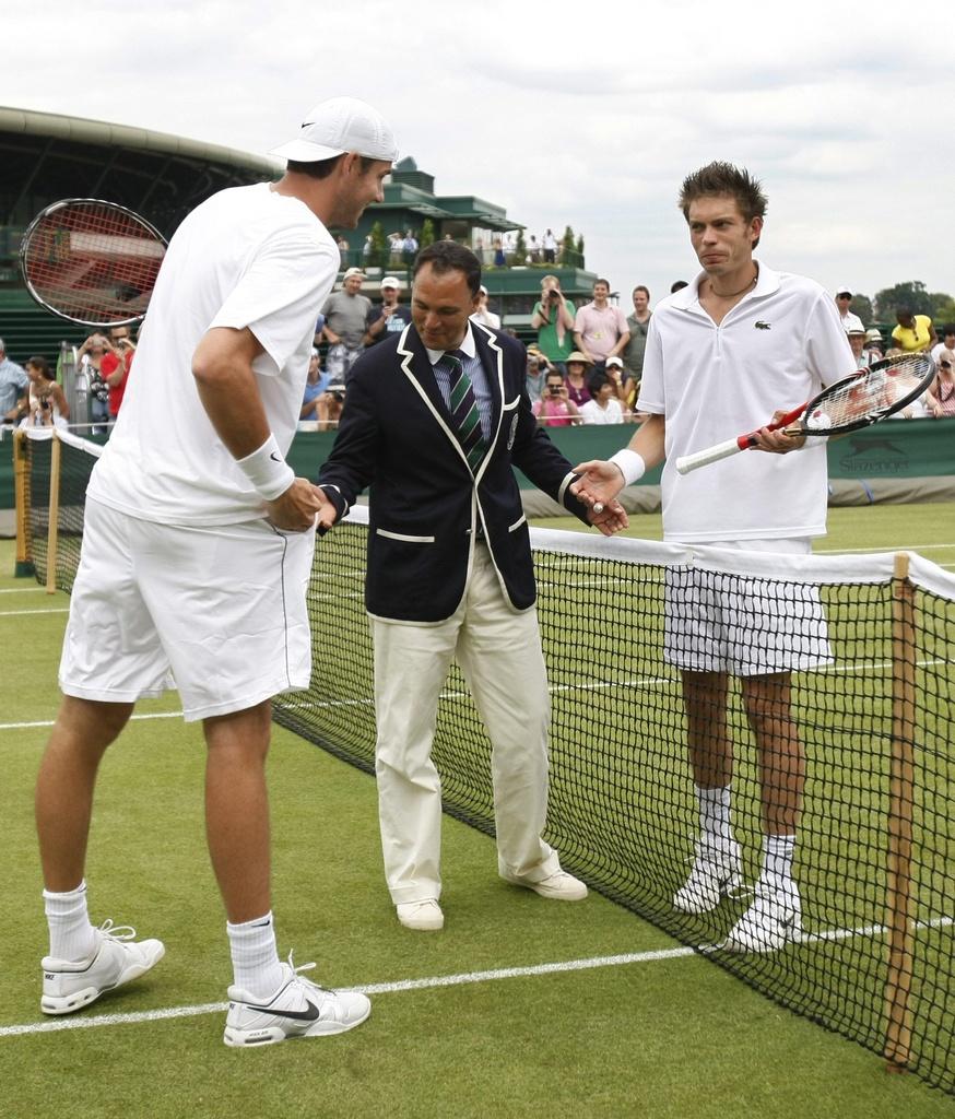 Isner et Mahut resteront dans l'histoire sans doute un long moment! [KEYSTONE - Alastair Grant]