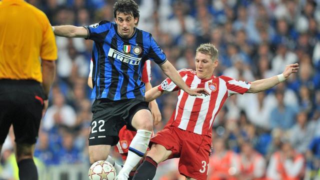 Diego Milito (Inter) et Bastian Schweinsteiger, finalistes en mai, se retrouveront cette fois dès les 8es. [Keystone - Peter Kneffel]