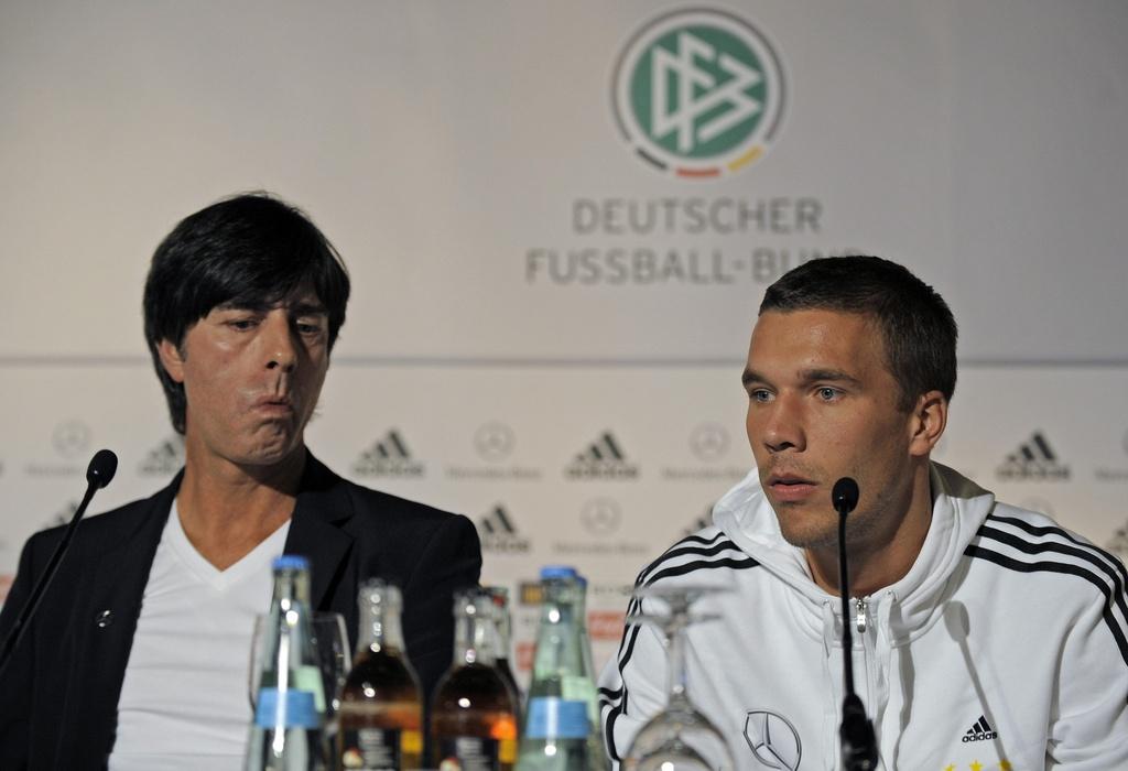 Joachim Löw et Lukas Podolski ne risquent pas grand-chose face à l'Azerbaïdjan. [KEYSTONE - Martin Meissner]