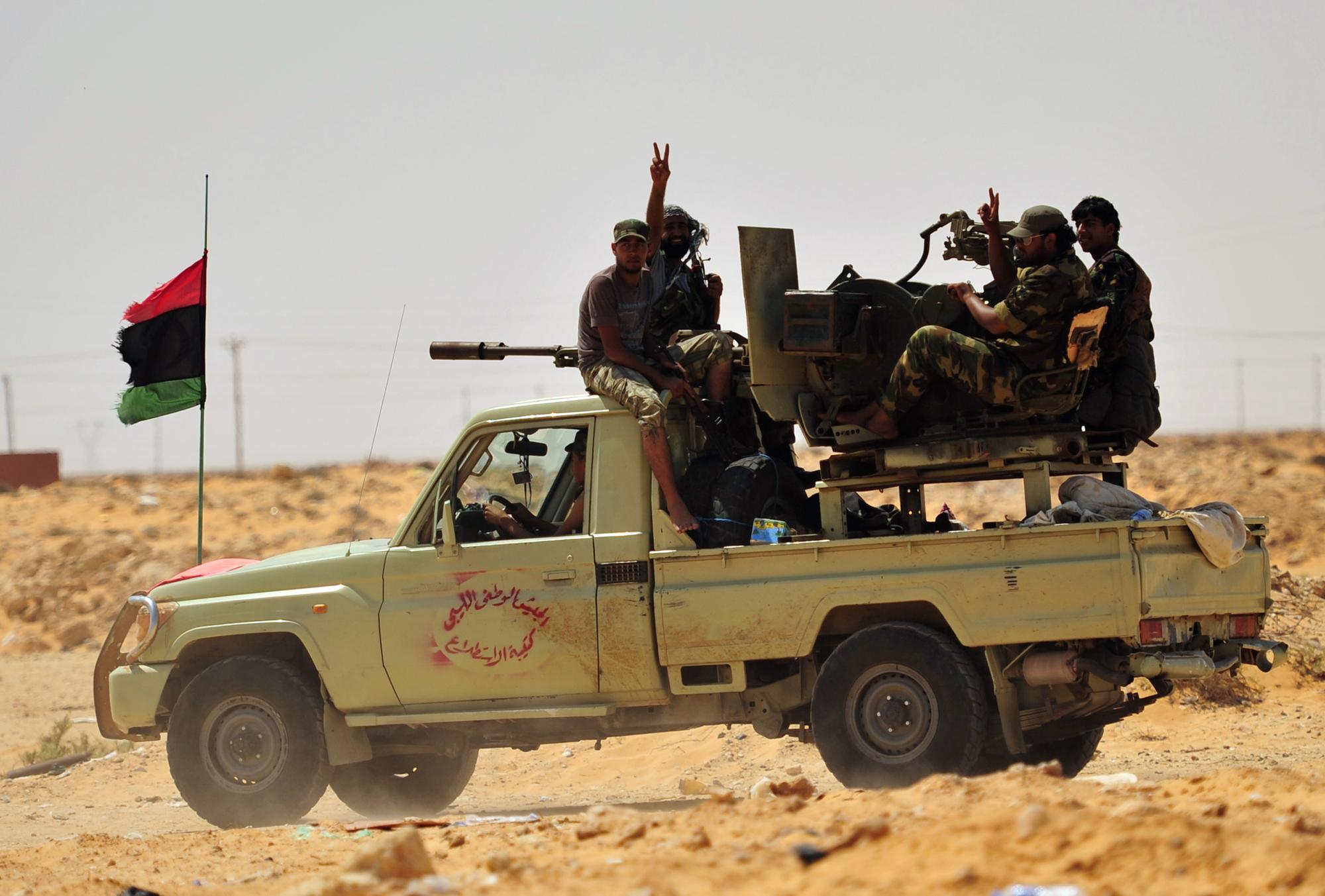 Les rebelles, qui se sont fixé pour priorité l'arrestation de Kadhafi et de ses fils, après 42 ans d'un pouvoir sans partage, estiment que l'ancien "Guide" a pu se réfugier à Syrte. [REUTERS - Esam Al-Fetori]