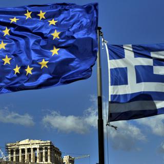 La Grèce, pressée par l'UE, la BCE et le FMI, devra faire de nouveaux efforts. [Aris Messinis]