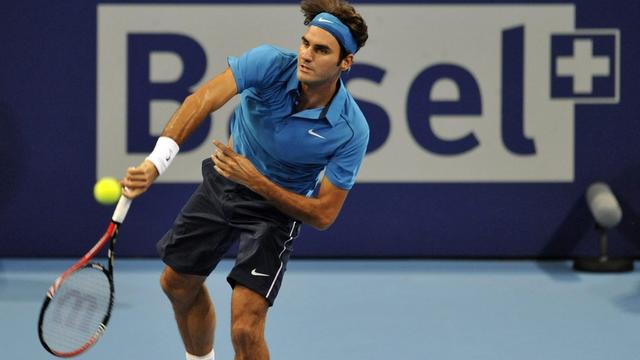 Roger Federer compte 9 succès en 10 matches face à Stanislas Wawrinka. [KEYSTONE - GEORGIOS KEFALAS]