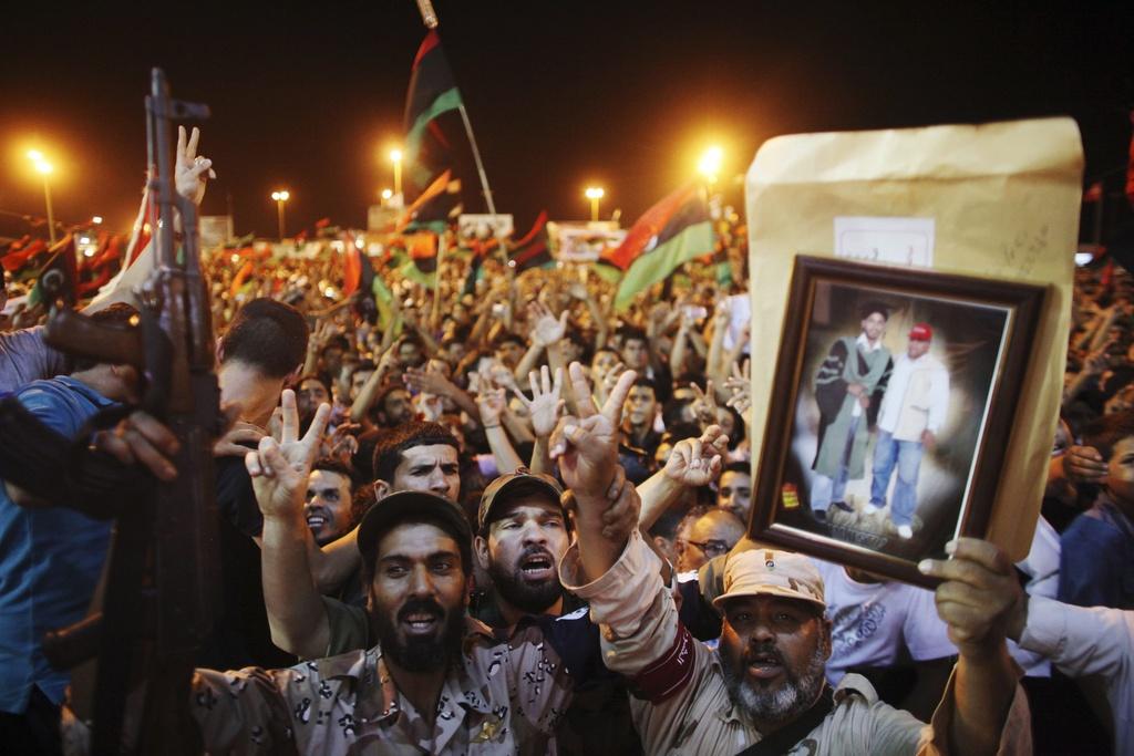 L’émotion est vive suite à la capture de deux des fils de Muammar Kadhafi à Tripoli. [Keystone - Alexandre Meneghini]
