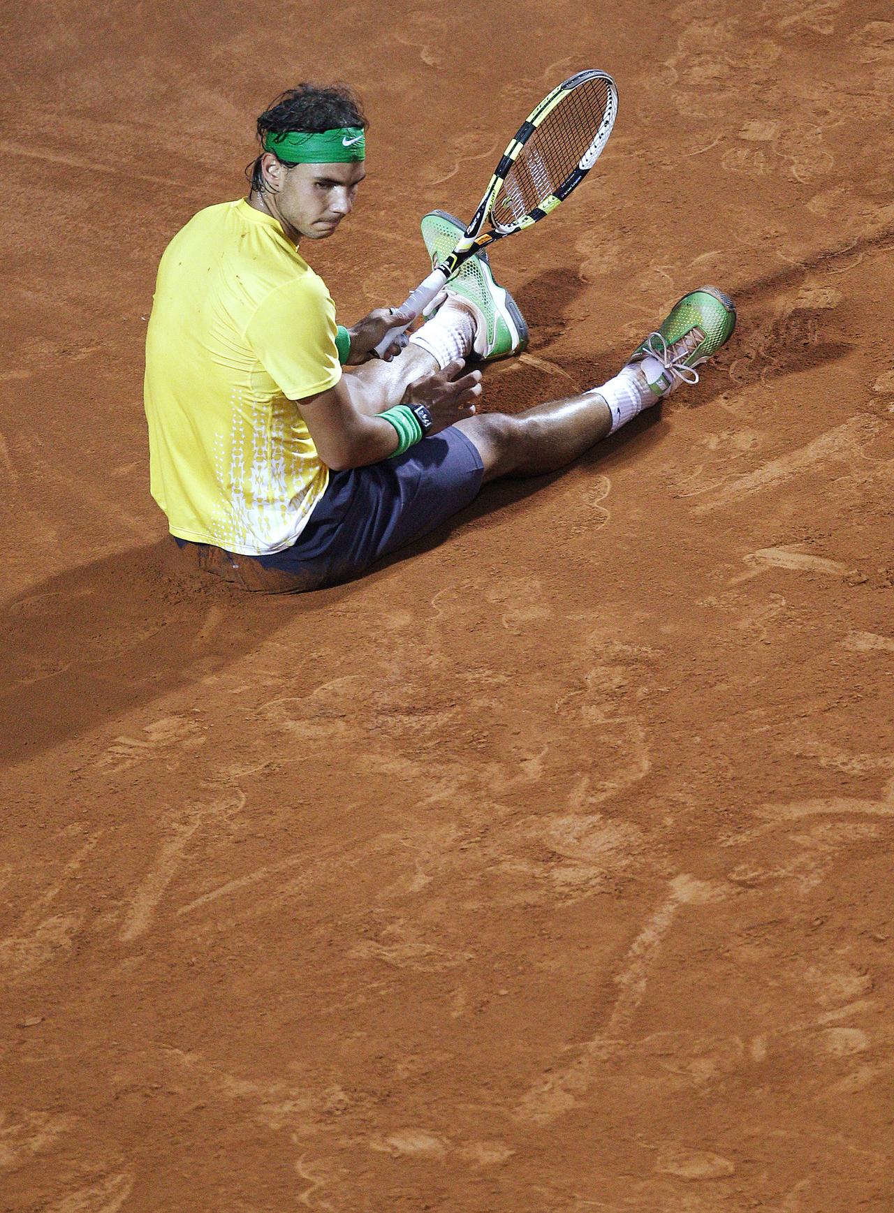 "Rafa" ne sait plus quoi faire. Il s'incline pour la 4e fois de suite devant "Nole". [Reuters - Max Rossi]