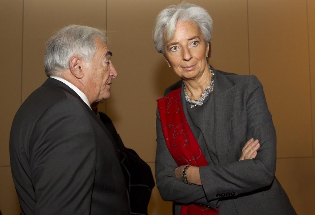 Christine Lagarde est évoquée pour reprendre le poste de DSK, cepednat elle est au coeur d'une controverse pour sa gestion de l'indemnisation de Bernard Tapie. [KEYSTONE - IAN LANGSDON / POOL]