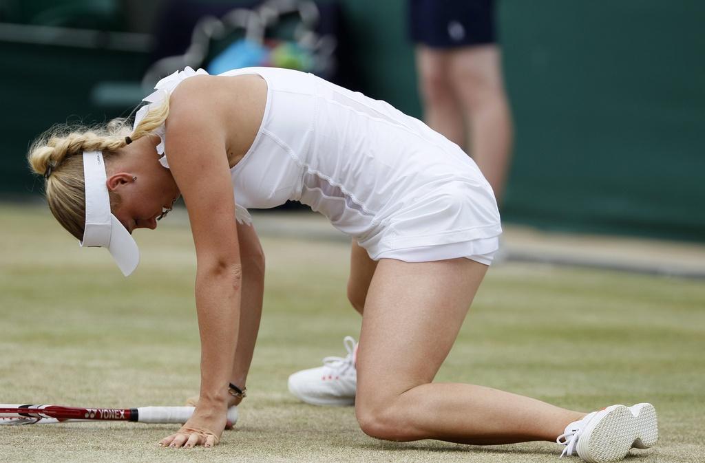 Caroline Wozniacki "court" toujours après son 1er titre en Grand Chelem... [Keystone - Alastair Grant]