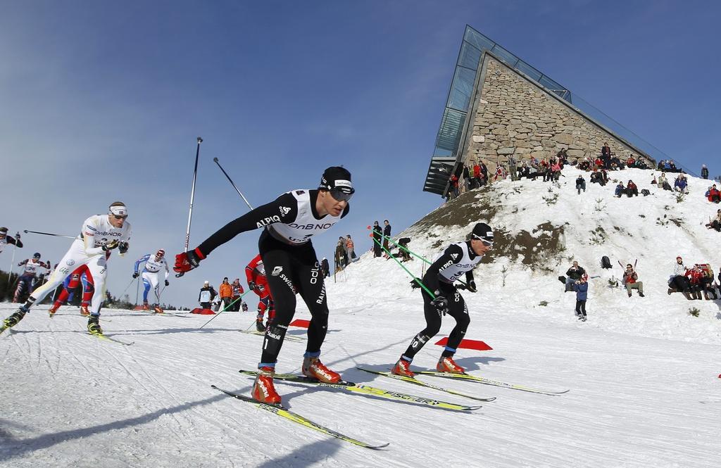 Dario Cologna aux côtés de Remo Fischer. Les 2 Helvètes occupaient alors encore les avant-postes... [Keystone - Peter Klaunzer]