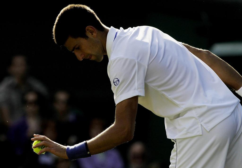 "Nole" n'a passé qu'une heure et vingt minutes pour sa rentrée sur gazon. [KEYSTONE - Sang Tan]