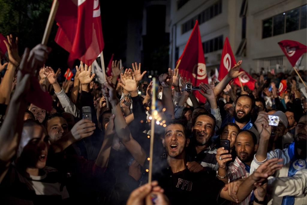 La victoire d'Ennahda a été célébrée dans les rues de Tunis. [KEYSTONE - Zacarias Garcia]