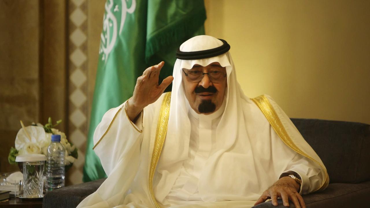 Le roi Abdallah d'Arabie saoudite fait un geste envers les femmes. [Joseph Eid]