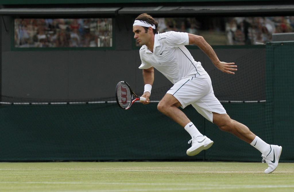 Roger Federer semble lancé à toute vitesse vers une 24e demi-finale en Grand Chelem. [Keystone - Anja Niedringhaus]