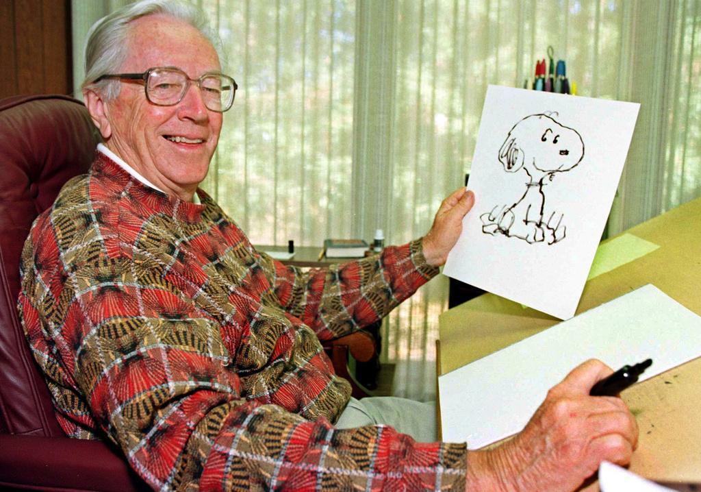 Snoopy et son papa Charles Schulz seront honorés pour les 60 ans de la naissance du petit chien à l'humour décapant. [Ben Margot]