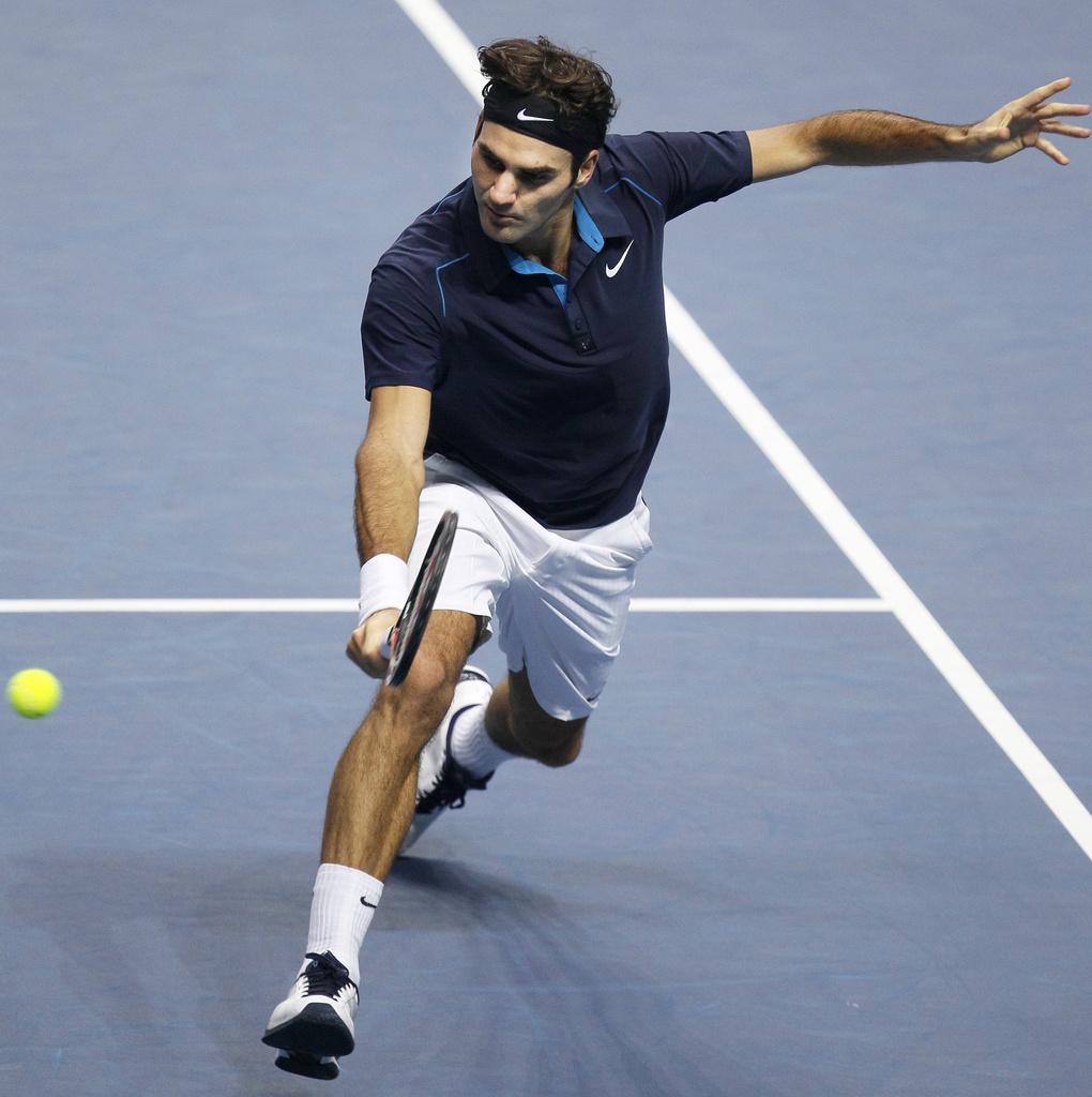 Grâce à ce succès, Federer est de reprendre la 3e place mondiale à Andy Murray. [KEYSTONE - Alastair Grant]