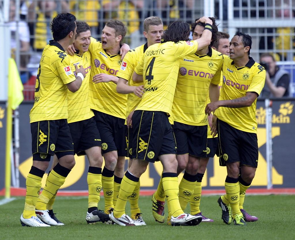 Lewandowski vient d'inscrire le 2-0 synonyme de titre pour Dortmund. [KEYSTONE - Sascha Schuermann]