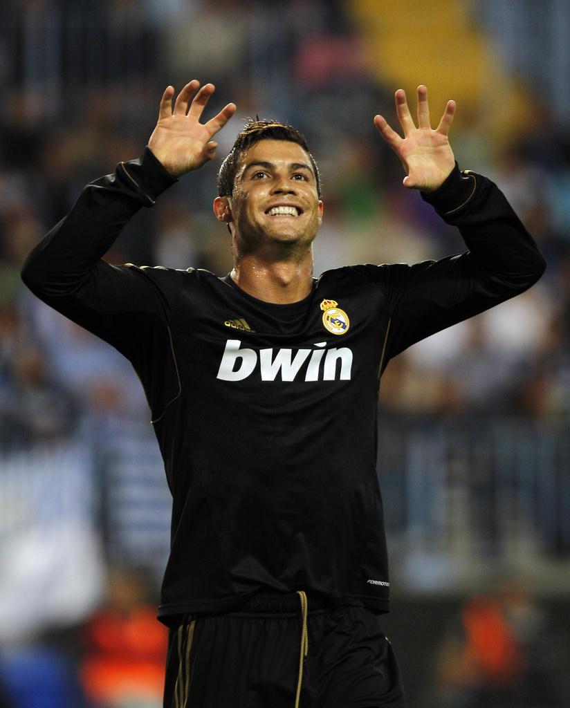 Déjà distingué en 2008, Cristiano Ronaldo s'affirme comme l'un des plus sérieux opposants au règne sans partage de Lionel Messi. [KEYSTONE - Sergio Torres]