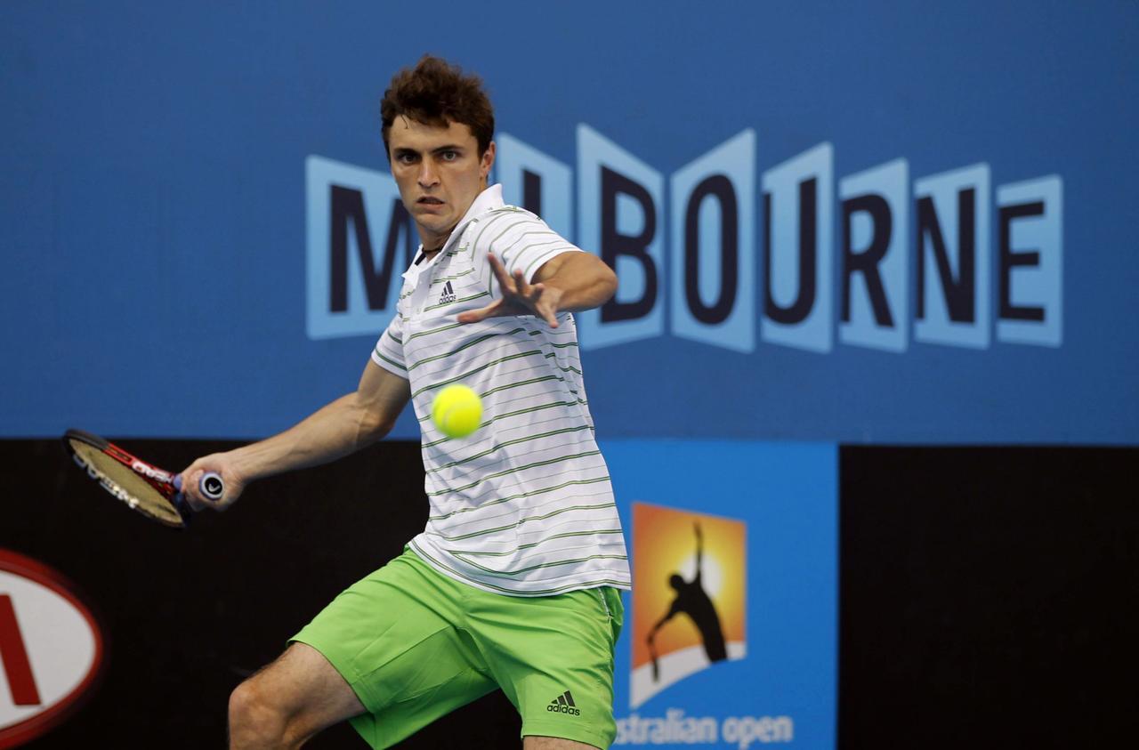 Gonflé à blocs, Gilles Simon sort d'un sacre à Sydney. [Yuriko Nakao]