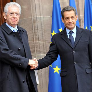 Mario Monti, Nicolas Sarkozy et Angela Merkel ont participé à un sommet tripartite à Strasbourg pour évoquer la crise de la dette européenne. [Michael Probst]