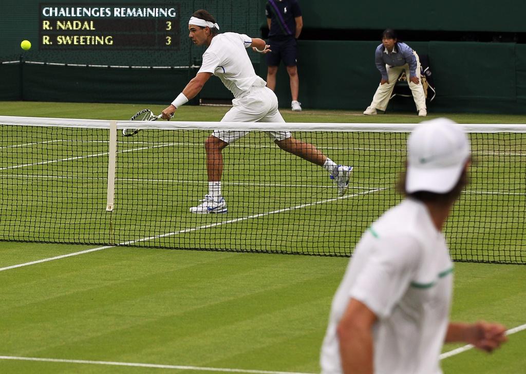 Ryan Sweeting semble bien loin de la planète Rafael Nadal... [Keystone - FELIPE TRUEBA]