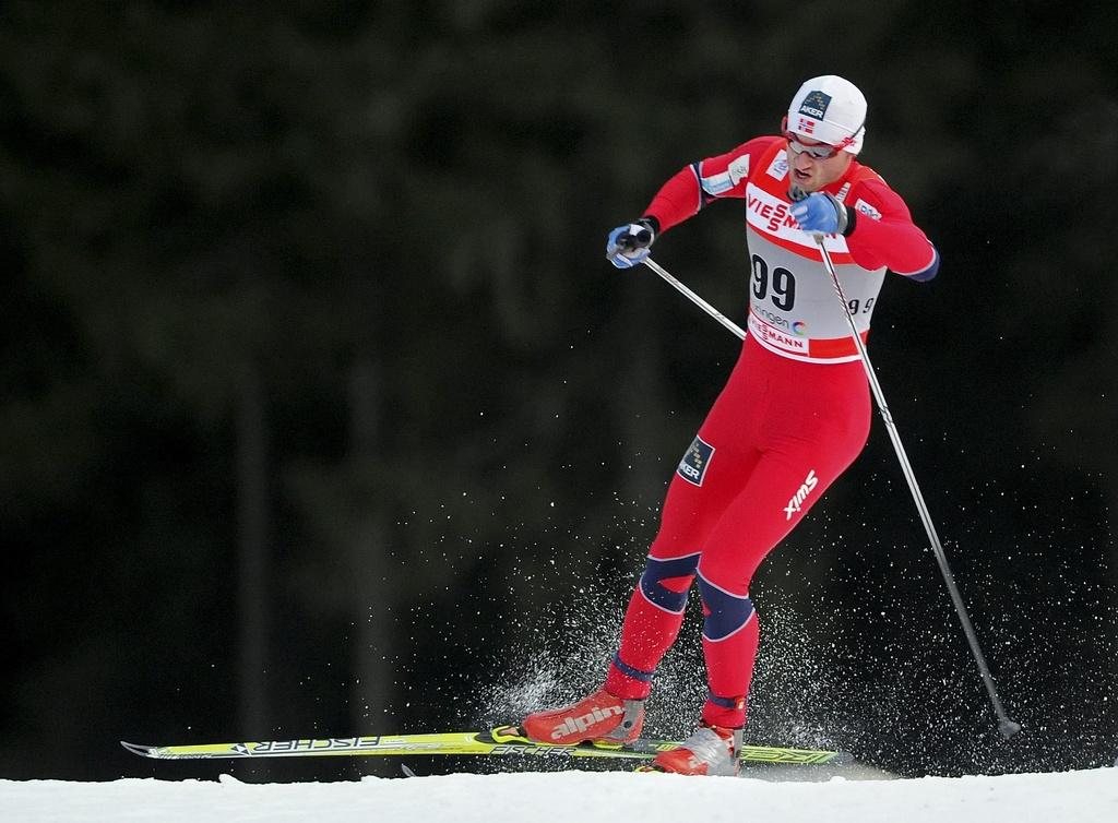 Northug partira avec 5"7 d'avance sur Cologna vendredi. [JENS MEYER]