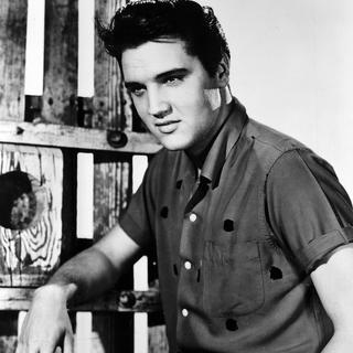 Portrait du chanteur américain Elvis Presley dans "King Créole", film de Michael Curtiz. [AFP - Collection Roger-Viollet]