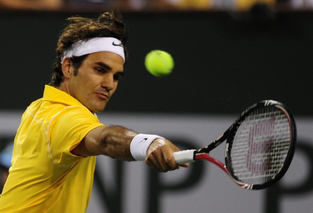 Roger Federer a eu droit à un 1er set difficile avant de passer l'épaule. [KEYSTONE - MIKE NELSON]