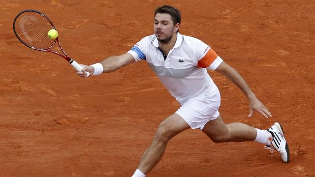 Stanislas Wawrinka est revenu de nulle part contre le Français, pas trop porté par le public parisien. [Christophe Ena]