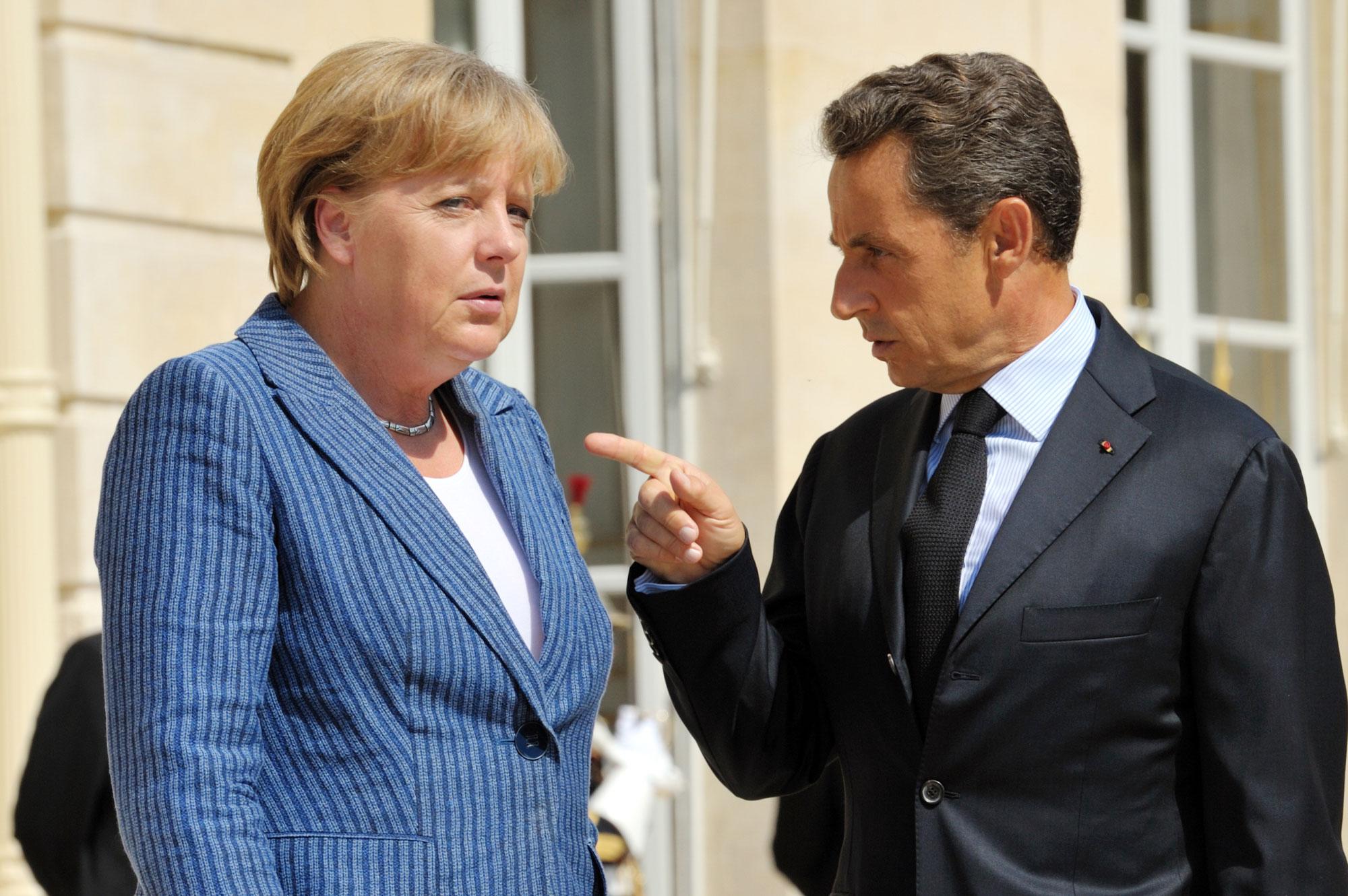Angela Merkel et Nicolas Sarkozy, ce mardi 16 août 2011 à l'Elysée. [Philippe Wojazer]