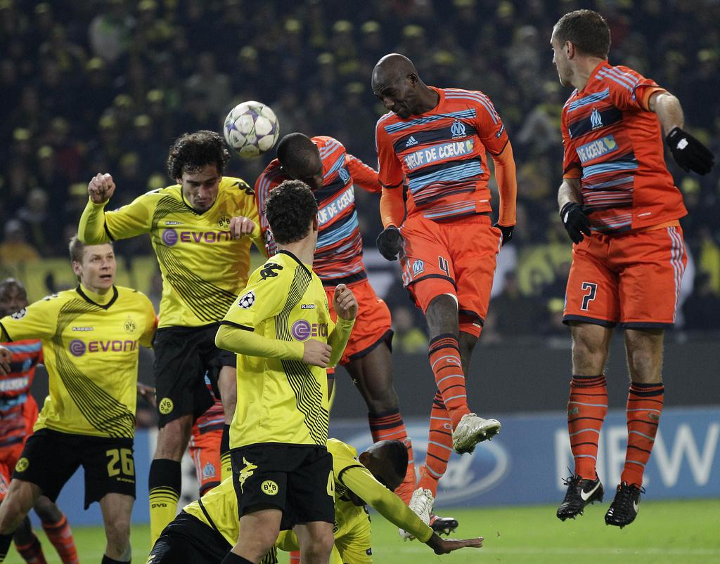 Menés 2-0, les Marseillais (en orange) se sont finalement imposés 3-2 à Dortmund et passent en 1/8 de finale. [Keystone - Frank Augstein]