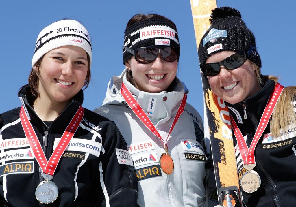 Wendy Holdener, Marianne Abderhalden et Fränzi Aufdenblatten: trois filles qui ont le sourire. [Keystone - Arno Balzarini]