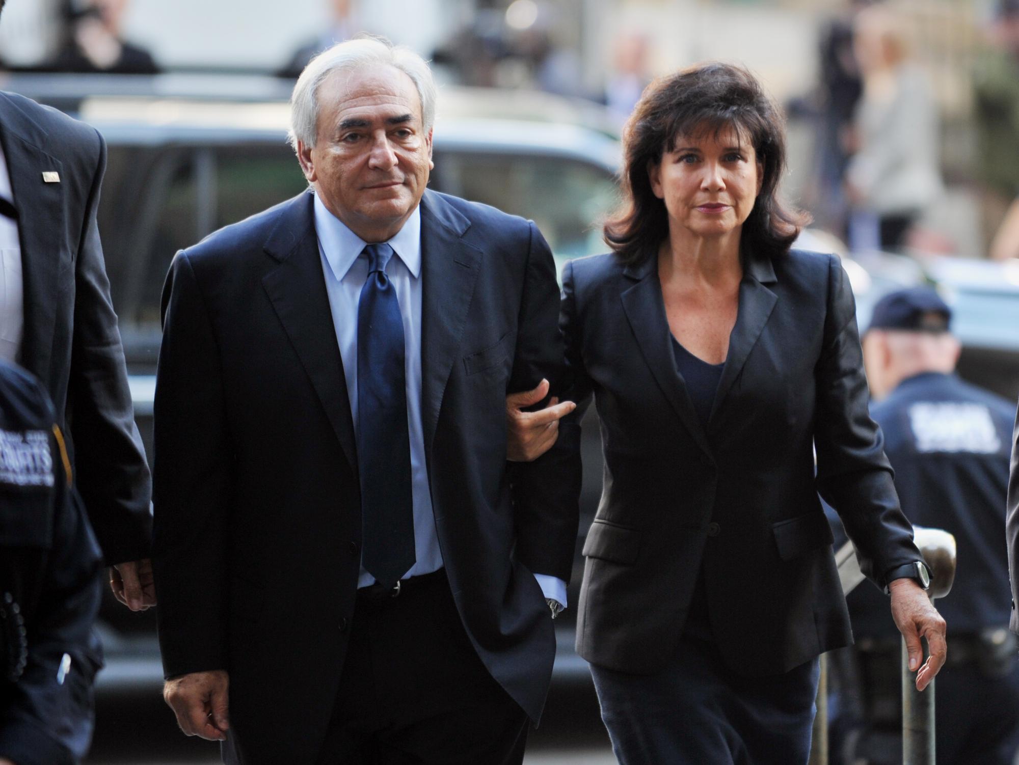 Dominique Strauss-Kahn est arrivé accompagné de son épouse Anne Sinclair. [AFP - STAN HONDA]
