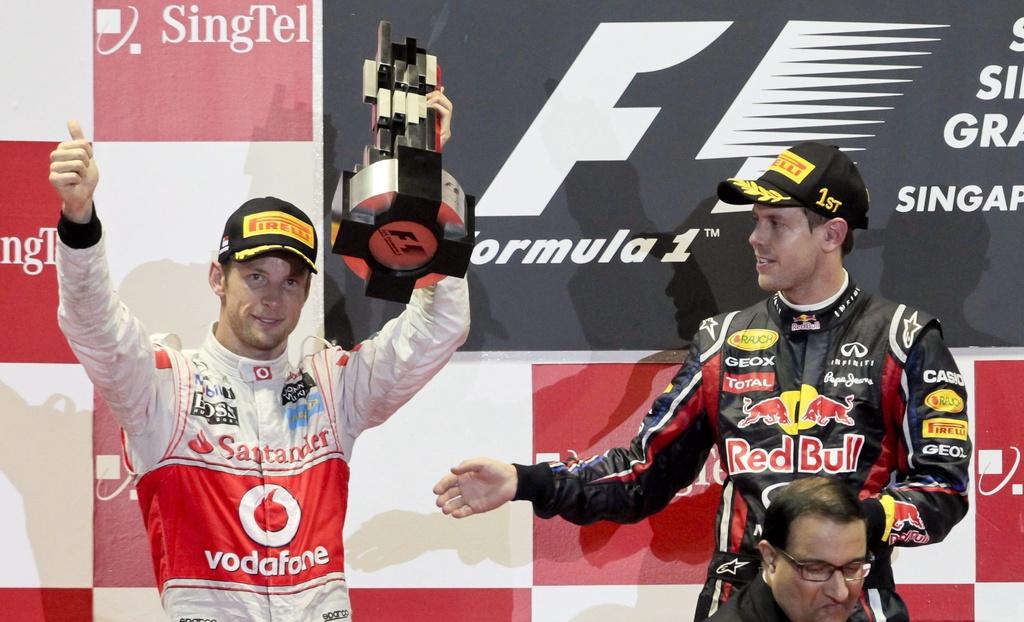 Jenson Button, 2e à Singapour, a encore un mini espoir de sacre mondial. [KEYSTONE - Stephen Morrison]