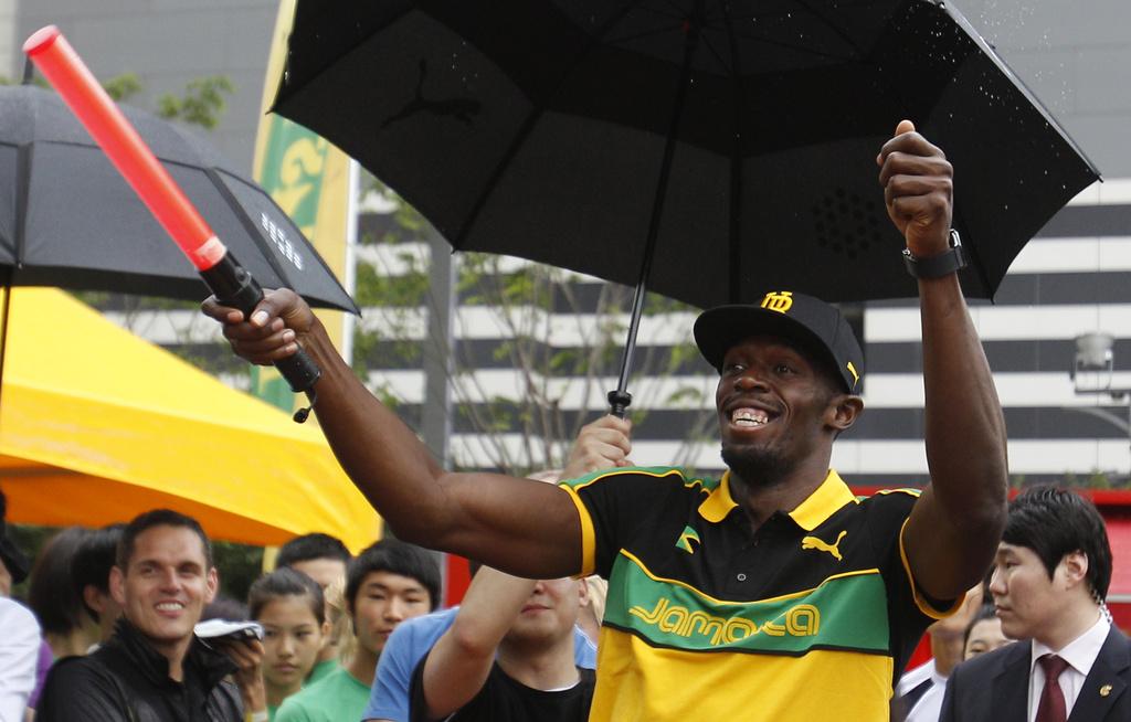 Arrivé à Daegu mardi dernier, Usain Bolt met déjà l'ambiance dans la ville sud-coréenne. [KEYSTONE - Lee Jin-man]