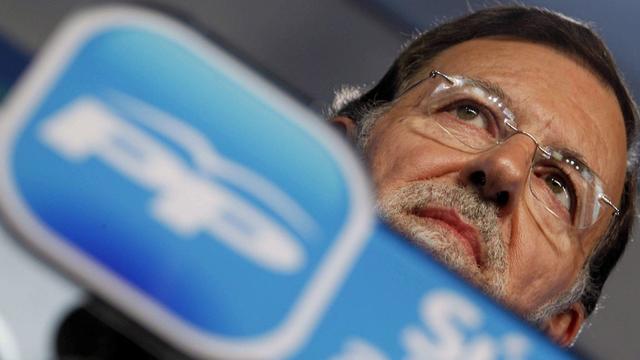 Mariano Rajoy doit plus sa victoire plus à la débâcle socialiste qu'à sa personnalité politique. [Javier Lizon]