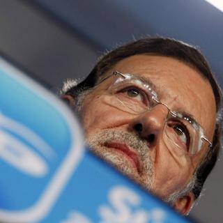 Mariano Rajoy doit plus sa victoire plus à la débâcle socialiste qu'à sa personnalité politique. [Javier Lizon]