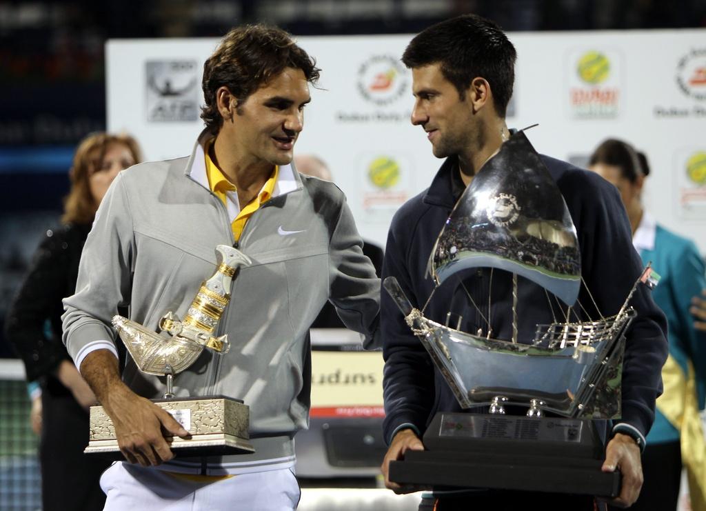 Les deux hommes ont le sourire cordial, mais c'est bien du deuxième rang ATP qu'il en va. [KEYSTONE - Ali Haider]