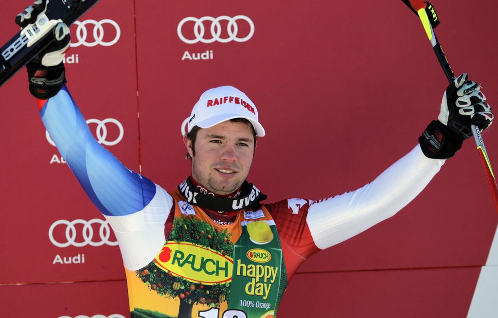 Victorieux la veille de sa 1ère course en Coupe du monde, Feuz a fêté cette fois une 3e place. [KEYSTONE - Alessandro Trovati]